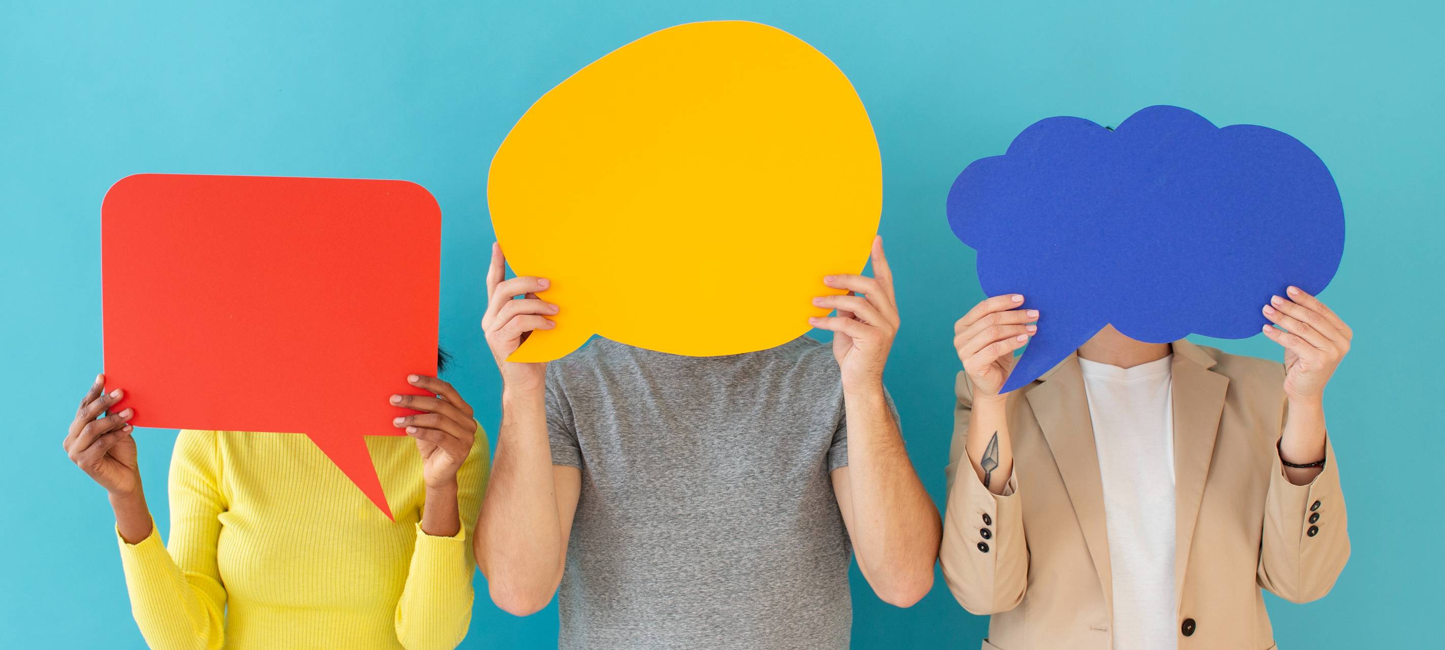 Menschen mit versch. Symbolen vor dem Kopf.